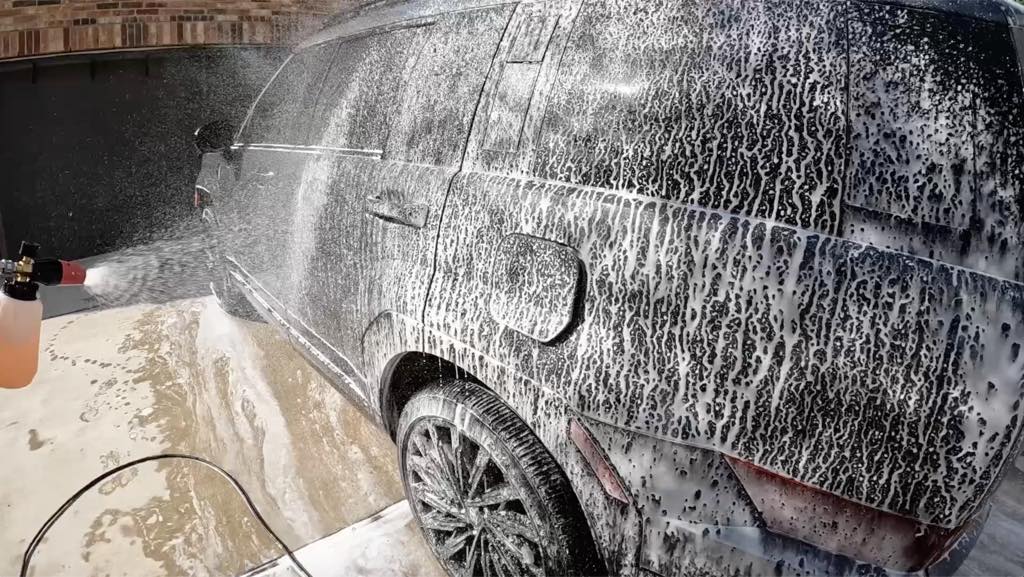 Formula 4 Spray Wax applied over the soap after the agitation wash, soapy water beading up on the paint